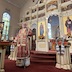 Archbishop Mark is standing with his crozier at the bottom of the three steps that are in front of the iconostas, and he is addressing congregation.